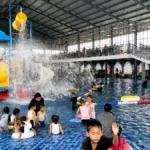 ayra splash park - ilustrasi berita Ayra Splash Park Kediri: Kolam Indoor dan Suasana Kebun untuk Wisata Keluarga