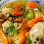 pindang ayam - ilustrasi berita Pindang Ayam dengan Tomat, Nanas, dan Kemangi: Hidangan Berkuah Gurih dan Segar
